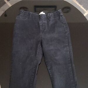 Black skinny bell bottom jeans.